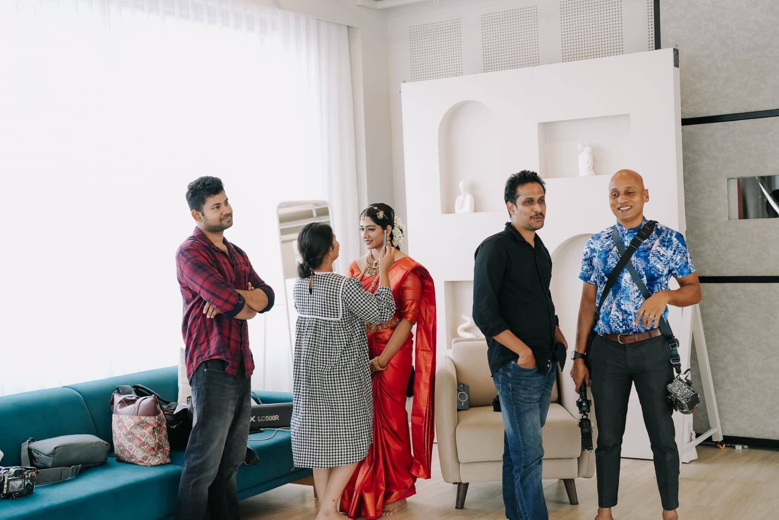 Behind the scenes: saree shoot team on the Lumen floor at Veedo studio Kochi
