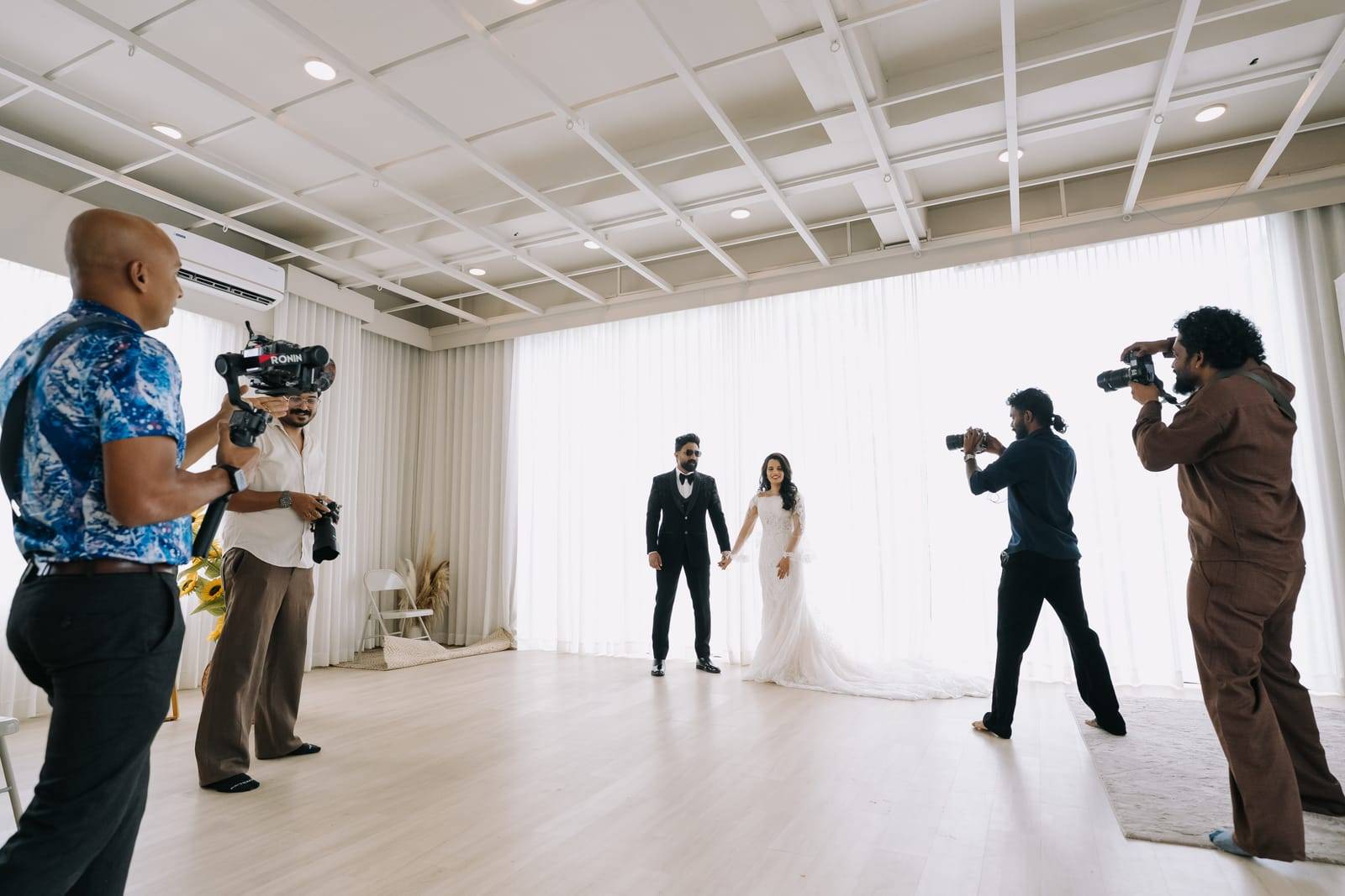 Behind the scenes: wedding film crew shooting a couple at Veedo studio, Kochi