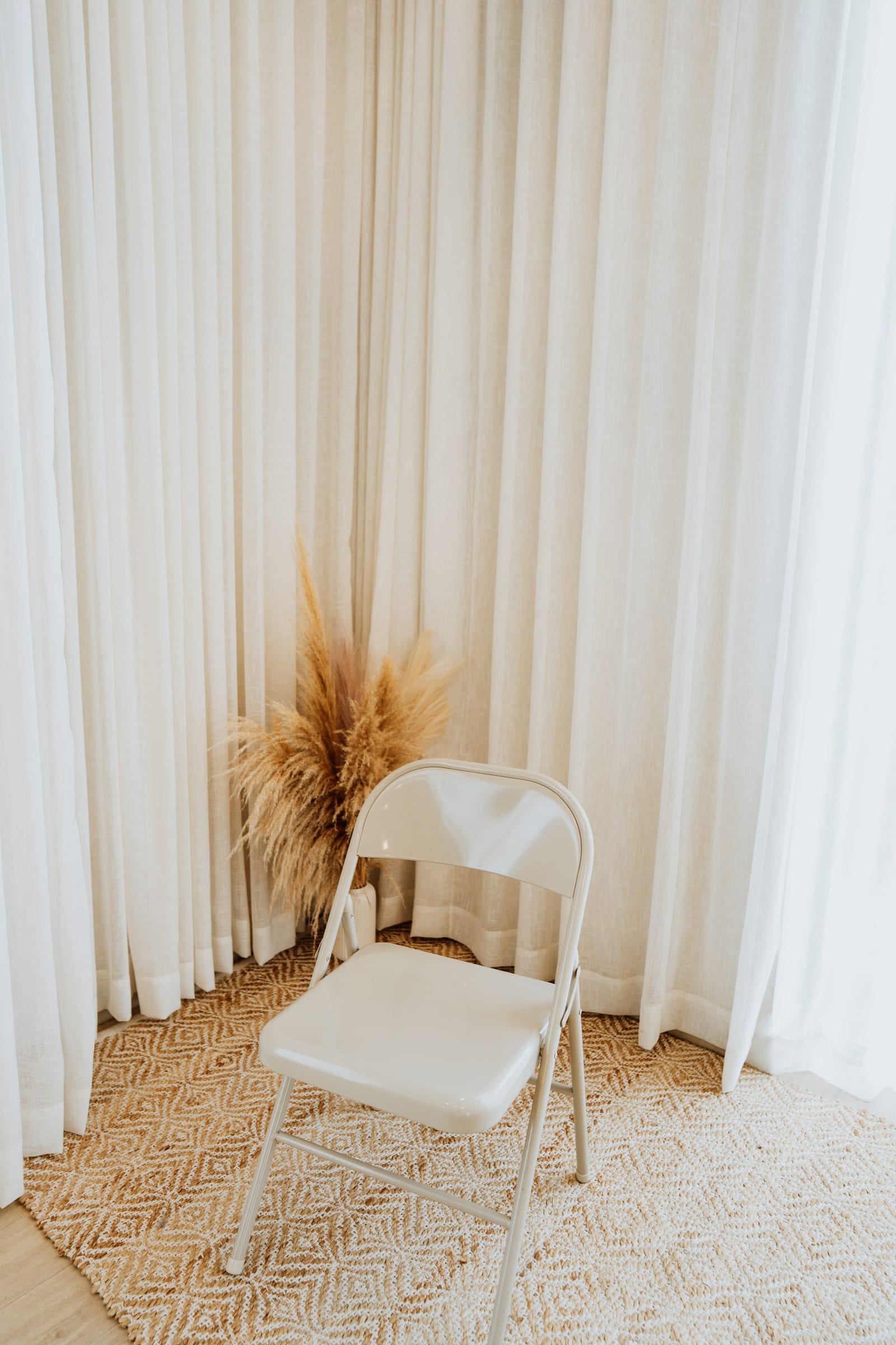 Chair and pampas grass portrait corner at Veedo Lumen studio